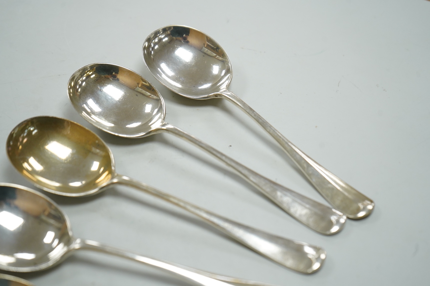 A set of five George V silver Hanoverian rat tail patter soup spoons, Walker & Hall, Sheffield, 1935, 17.9cm, 10.6oz.